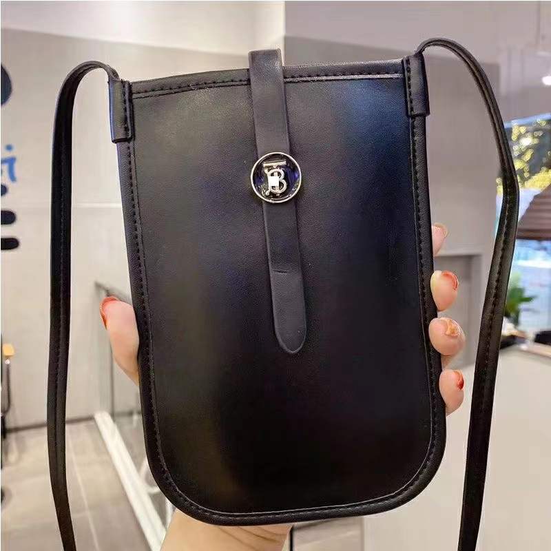 Crossbody nahkapuhelinpussi
